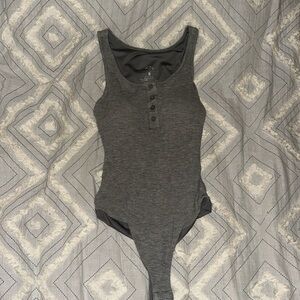 Grey Klassy Network body suit. Henley style